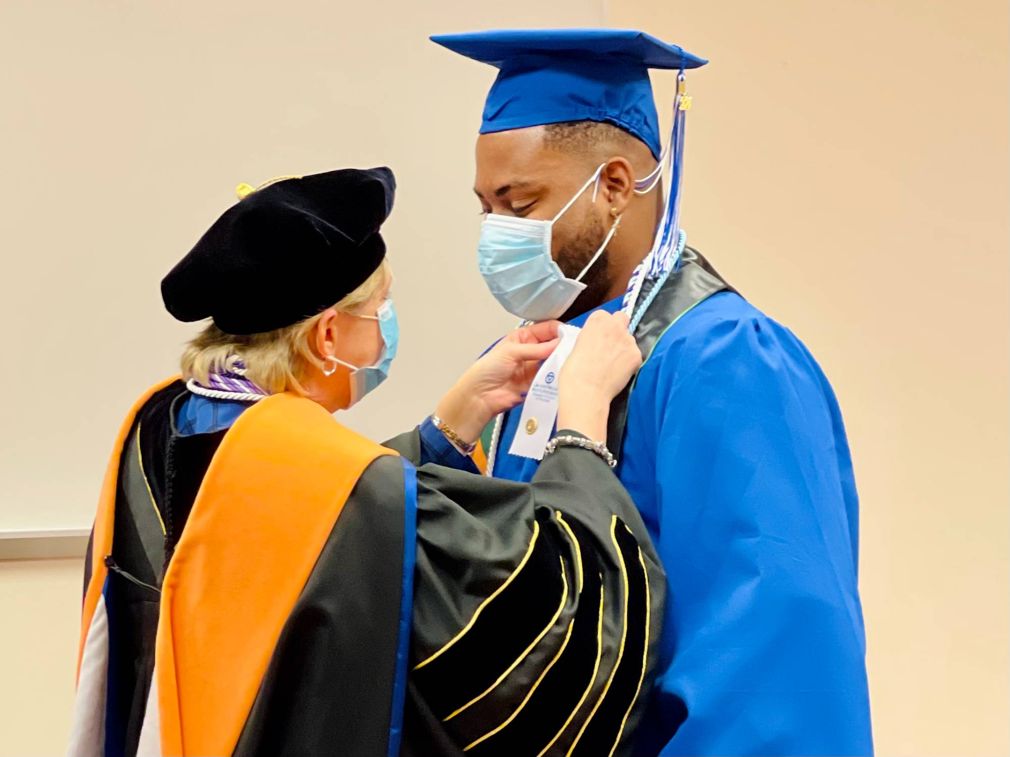 Image of male nursing graduate